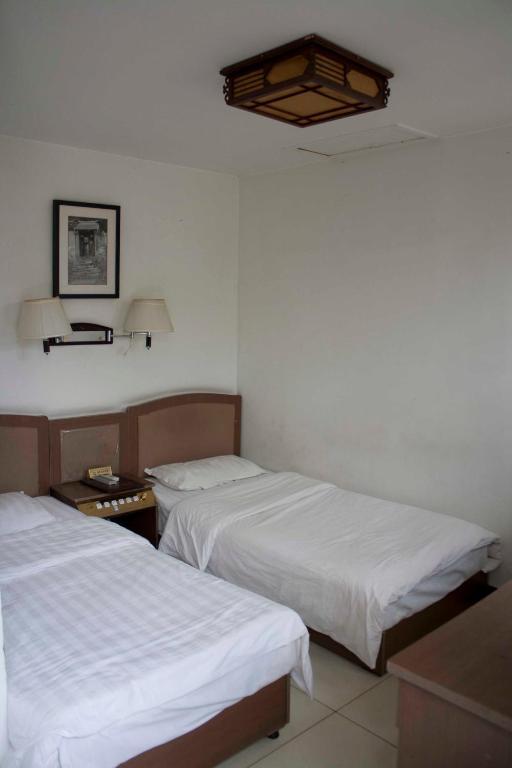 Three Legged Frog Hostel Peking Rum bild